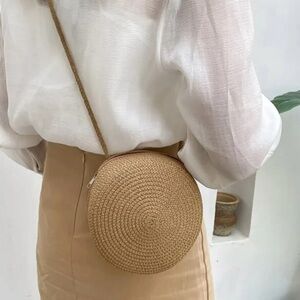 Woven round cross-body bag